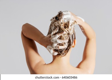 Woman Washing Her Blond Hair