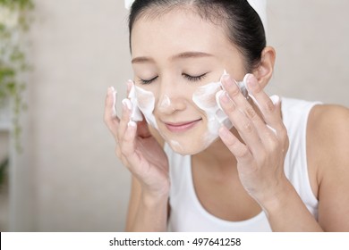 Woman Washing Her Face