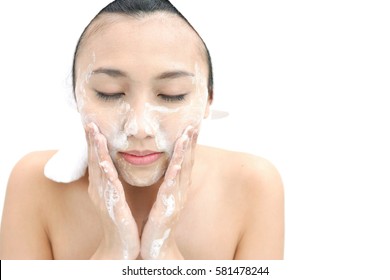 Woman Washing Her Face, Eyes Closed