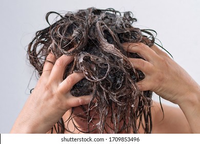 A Woman Washing Her Hair