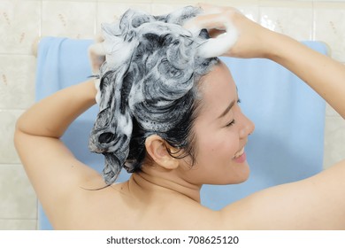 Woman washing her hair.