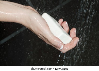 Woman Washing Her Hand Using A Bar Of Soap