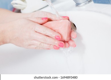 Woman Washing Her Hands In Sink To Get Rid Of Dirt Germs Using Bar Of Soap. Corona Virus Prevention, Hygiene To Stop Spreading Coronavirus.