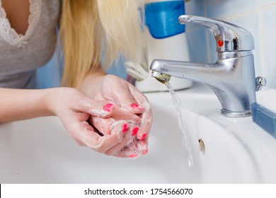 Woman Washing Her Hands In Sink To Get Rid Of Dirt Germs Using Bar Of Soap. Corona Virus Prevention, Hygiene To Stop Spreading Coronavirus.