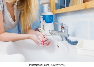 Woman Washing Her Hands In Sink To Get Rid Of Dirt Germs Using Bar Of Soap. Corona Virus Prevention, Hygiene To Stop Spreading Coronavirus.