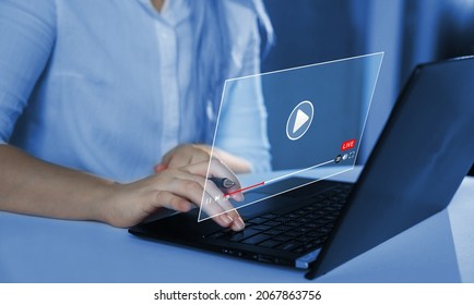 Woman watching a 
live stream. Online live stream window. Video streaming on internet concept. Live digital stream multimedia player. - Shutterstock ID 2067863756