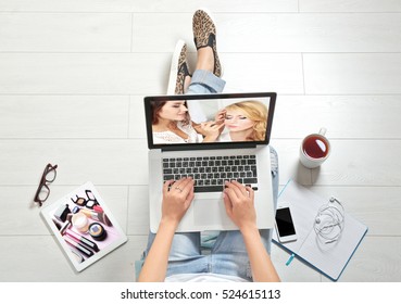 Woman Watching Online Tutorial On Laptop. Makeup And Beauty Blog.