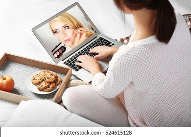 Woman Watching Online Tutorial On Laptop. Makeup And Beauty Blog.