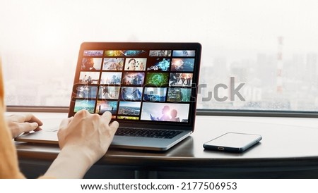 Woman watching a photo library.