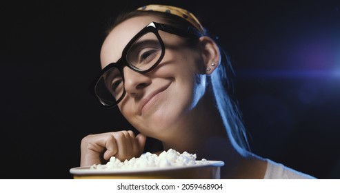 Woman Watching A Romantic Comedy Movie At The Cinema And Eating Popcorn, Entertainment Concept