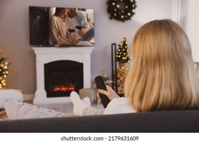 Woman Watching Romantic Movie On TV At Home