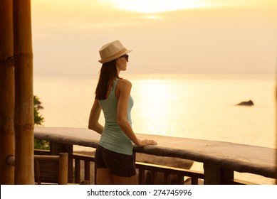 Woman Watching The Sunrise. 