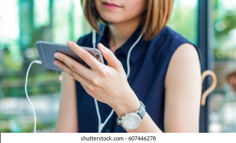 Woman Is Watching A Video On Her Mobile