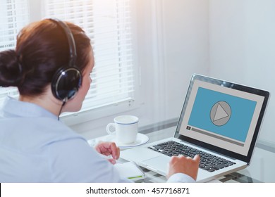 Woman Watching Video Tutorial On Computer, Business Education Online, Multimedia