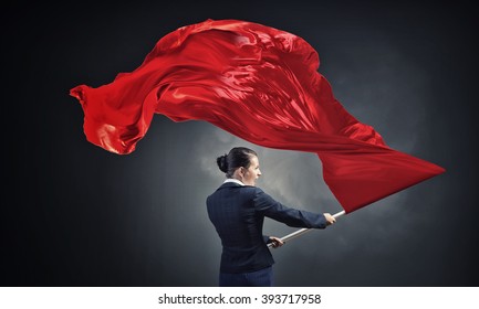 Woman Waving Red Flag