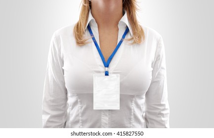 Woman wear big blank white vertical badge mockup, stand isolated. Name tag on neck and chest. Person identity label. Women in shirt uniform with empty id card mock up. Bussinesswoman lanyard design.
