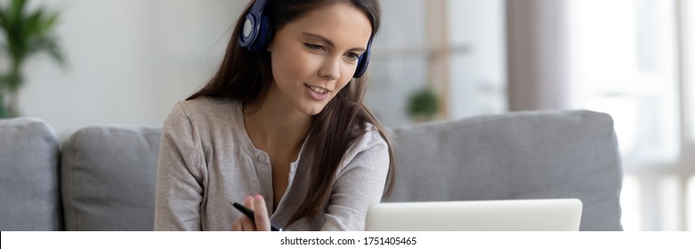 Woman Wear Headphones Talk Via Video Conference Provide Consultation Help To Client Do Remote Job From Home. E-study Using Modern Tech Concept, Horizontal Photo Banner For Website Header Design Tech