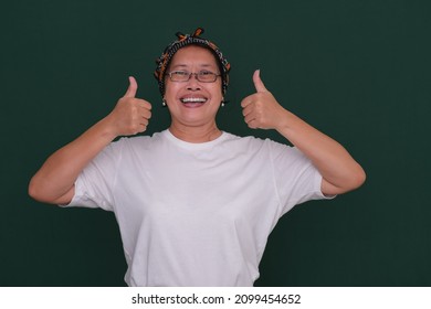 Woman Wearing Bandana, Raising Her Two Thumbs Up. 