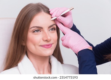 Woman wearing bathrobe in beauty clinic, aesthetics, patient, cosmetic procedures. botox application. anti wrinkle and anti aging. - Powered by Shutterstock