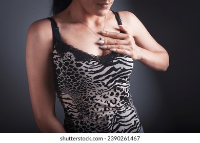 woman wearing black lace bra, studio shot