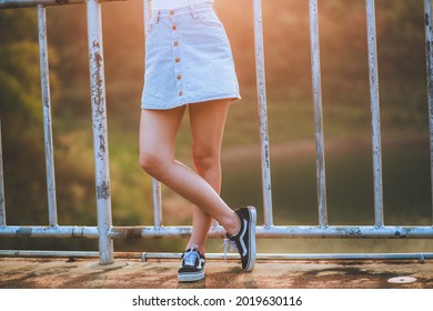 Woman Wearing Blue Denim Mini Skirt,Street Fashion,vintage.