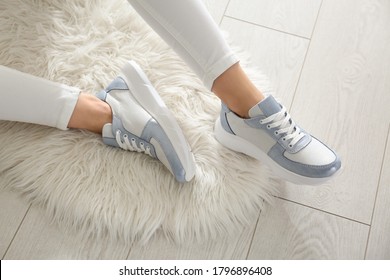 Woman Wearing Comfortable Stylish Sneakers Indoors, Closeup