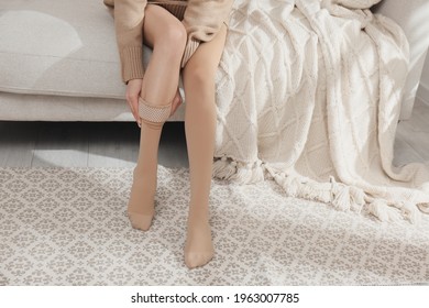 Woman Wearing Compression Tights Indoors, Closeup. Space For Text