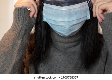 Woman Wearing Double Protective Mask