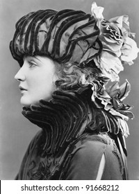Woman Wearing Elaborate Hat