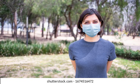 Woman Wearing Face Mask In Park