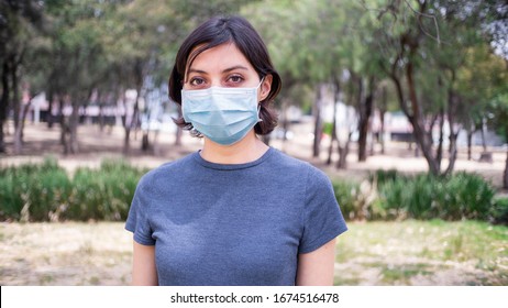 Woman Wearing Face Mask In Park