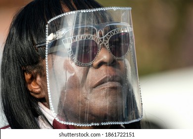 A Woman Wearing A Face Shield Lines Up For COVID-19 Test During A Free COVID-19 Testing In Los Angeles, Wednesday, Nov. 25, 2020.  (Ringo Chiu Via AP)