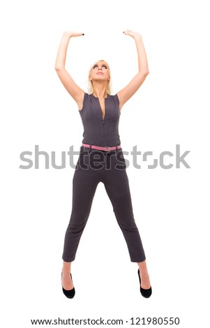 woman wearing a fashionable jumpsuit with holding gesture on an isolated white background