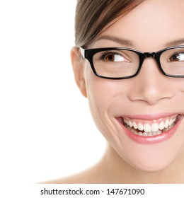 Woman Wearing Glasses Looking Happy To Side. Eyewear Woman With Big Smile Wearing Eyeglasses. Close Up Portrait Of Female Spectacles Model Isolated On White Background. Mixed Race Asian Caucasian Girl