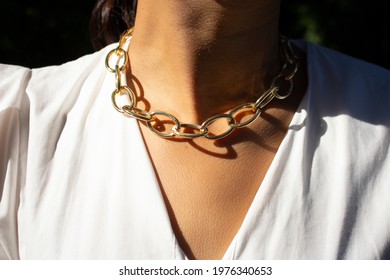 
Woman Wearing Gold Necklace, Wearing White Dress. Woman Wearing Necklace