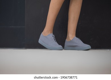 Woman Wearing Grey Shoes Outside