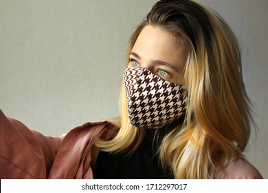 Woman Wearing Handmade Cloth Cotton Face Mask And Making Selfie At Home. Corona Virus Concept. Quarantine Concept. Reusable Face Mask.