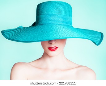 Woman Wearing Hat. Fashion Studio Portrait