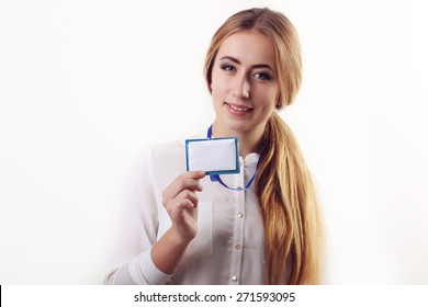 Woman Wearing ID Badge On Lanyard Around Her Neck