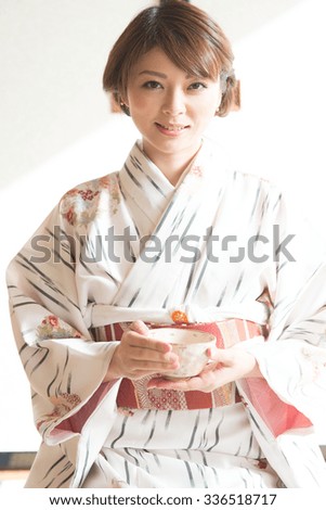 Similar – Foto Bild Frau in roten Kimono malt in blau