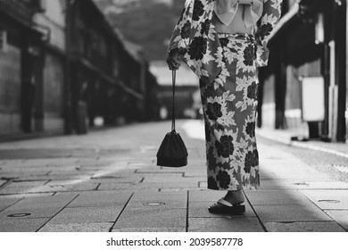 Woman Wearing A Kimono And Kanazawa City, Japan