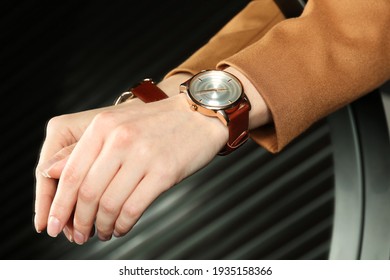 Woman Wearing Luxury Wristwatch Near Mirror, Closeup