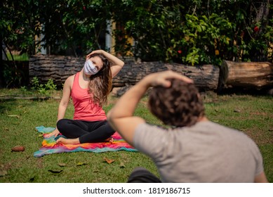 Woman Wearing Mask On A Fitness Class Outdoors