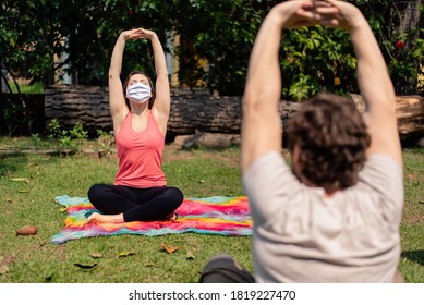 Woman Wearing Mask On A Fitness Class Outdoors