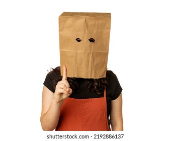 Woman Wearing Paper Bag Over Her Head Holding Up One Finger