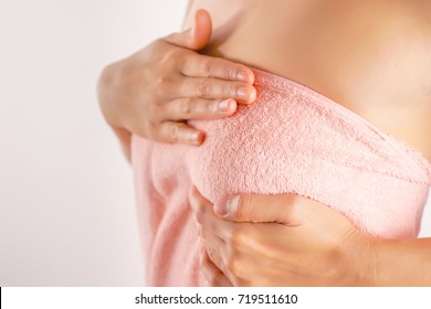 Woman Wearing A Pink Strapless Checking Her Breast, Breast Self-Exam (BSE), How do I check breast concept, Breast Cancer Awareness