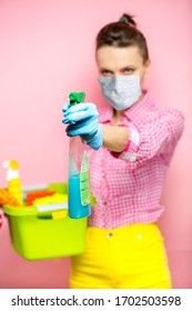 Woman Wearing Protective Mask With House Supplies Ready To Clean Room. Spring Cleaning. Deep Cleaning For Covid-19 Disease Prevention