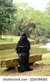 Woman Wearing Purdah Reading Book On Stock Photo 1024784083 | Shutterstock