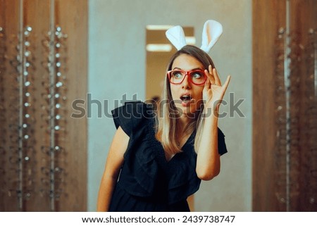 
Woman Wearing Red Eyeglasses and Easter Bunny Ears. Cheerful customer celebrating holiday discount sales 
