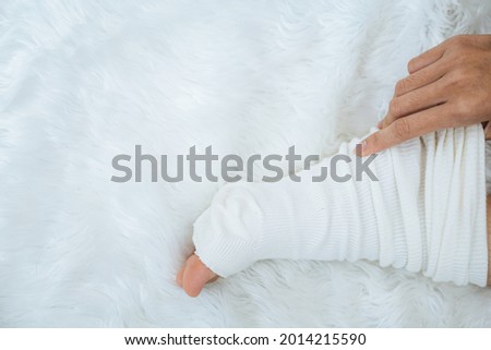 woman wearing socks on a cold day.
